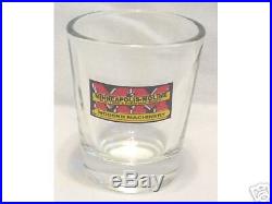 MINNEAPOLIS MOLINE TRACTORS LOGO ON A CLEAR SHOT GLASS