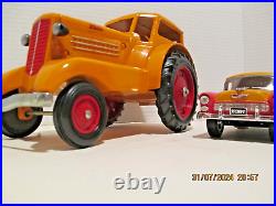 Vintage Minneapolis Moline toy 1/16 tractor and Ertl'55 Chevy Delivery. Farm