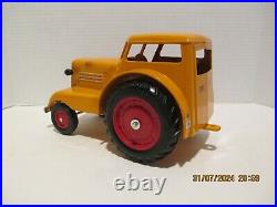 Vintage Minneapolis Moline toy 1/16 tractor and Ertl'55 Chevy Delivery. Farm